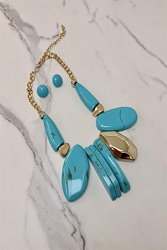 Chunky geometric statement necklaces in turquoise and pink